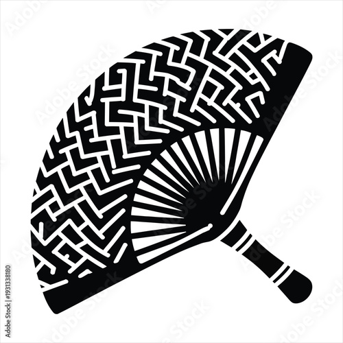 Traditional Japanese fan with intricate geometric cutout pattern