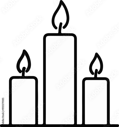 Three lit candles of varying heights stand on a dark surface
