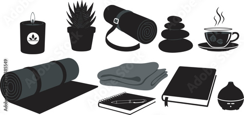 Yoga wellness and mindfulness essentials flat lay with yoga mat, meditation stones, candle, and healthy lifestyle accessories on white background