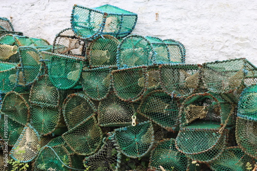 Konstfotografi Lobster and crab pots and creels stacked up in a harbour