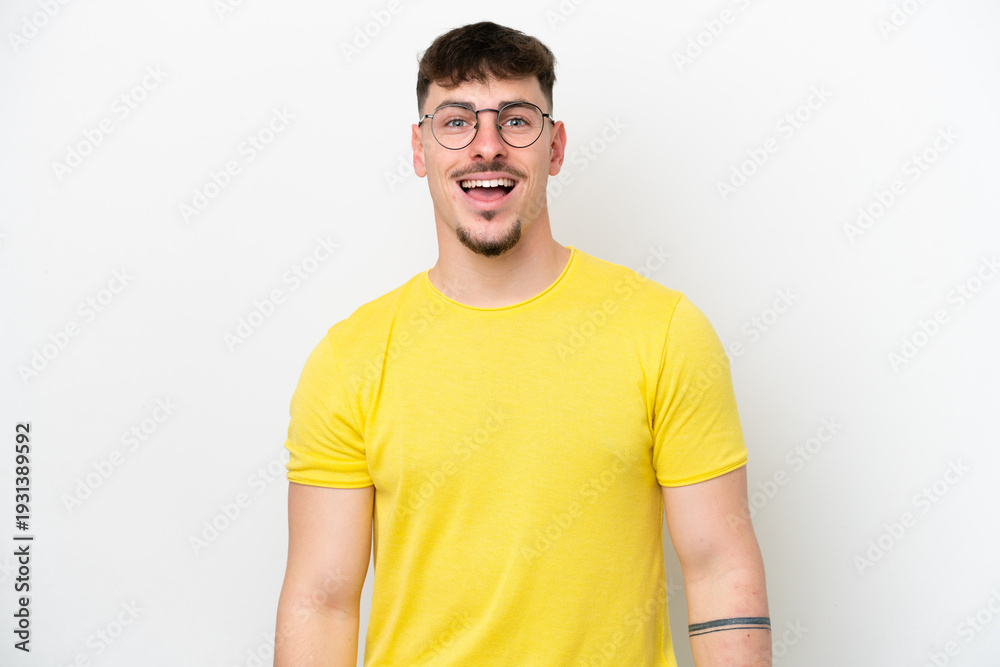Fototapeta premium Young caucasian handsome man isolated on white background with surprise facial expression