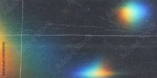 Prismatic Spectrum of Light: A captivating display of a spectrum of vibrant colors, reminiscent of a rainbow, casts across a textured surface.