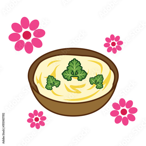 Creamy dip in a bowl with green garnish and pink floral decorations.