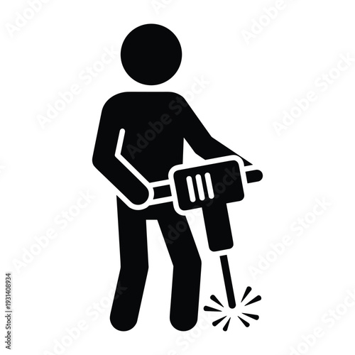 Construction worker using a pneumatic jackhammer drill to break concrete pavement on a road repair site project