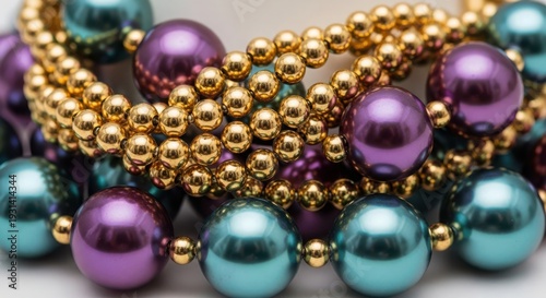 A close-up of a beaded bracelet with purple and blue beads