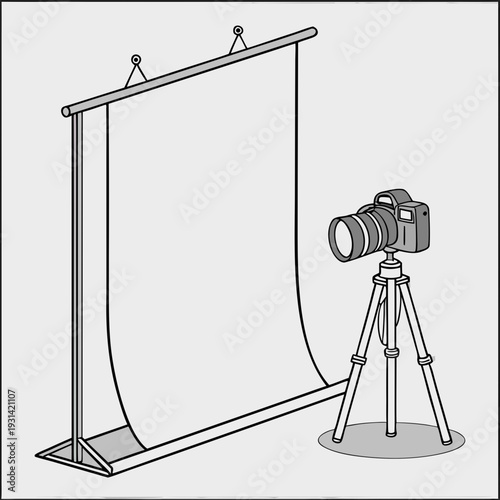 Professional photography studio setup with camera and backdrop.