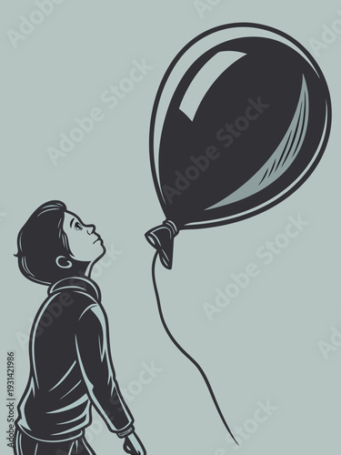 Young boy looking up at a floating balloon.