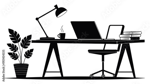 Black laptop on office table with lamp books and plant silhouette modern workspace setup