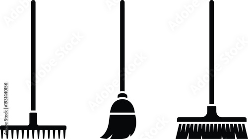 Black garden rake and broom icons set, cleaning and gardening tools silhouettes vector illustration isolated background