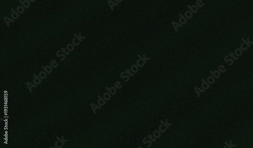 Foto A dark, uniform background featuring a subtle grainy texture, providing a minimalist and versatile digital backdrop for various design projects