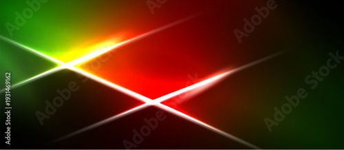 Bright abstract lines intersect. Vivid colors blend, creating dynamic visual effect. Black background emphasizes luminosity.