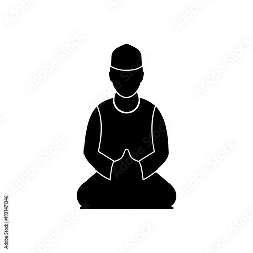Silhouette of a person in a meditative pose with hands folded in lap