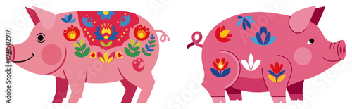 Two pink pigs decorated with colorful traditional Polish folk floral motifs