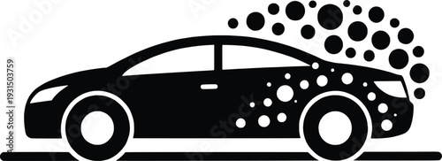 Black car covered in soap bubbles on a road