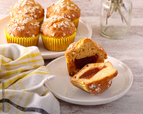 Homemade oat muffins with marmalade