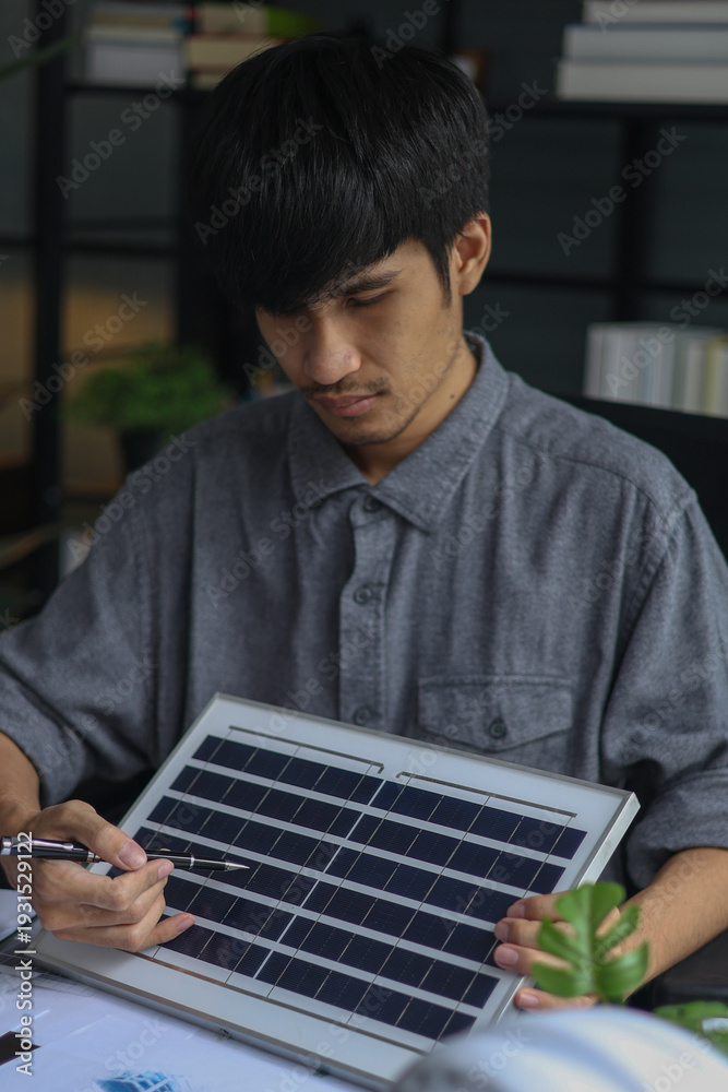 Fototapeta premium Architect Planning a Modern Solar Power House.