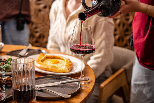 Red wine served with traditional cuisine