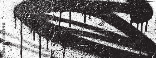 Textured concrete wall background with abstract spray paint shadows and dripping effect in black and white.