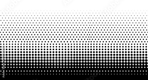 Black and white halftone dot pattern abstract background.