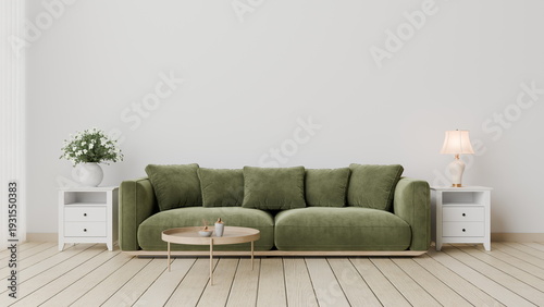 Foto green sofa sits in the living room next to white side tables
