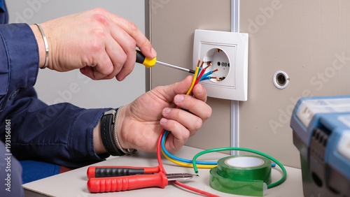 electrician working on electrical wires
