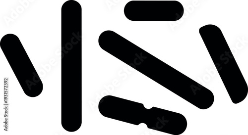 Minimalist flat design scattered rounded capsule shapes black on white background close up abstract composition geometric negative space bold modern