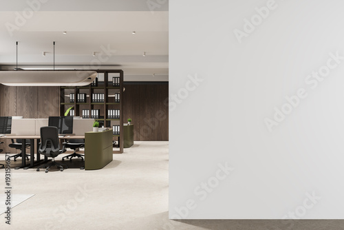 Modern office interior with spacious workspace and a large empty wall serving as a clean poster mockup backdrop for design display."" 3D Rendering