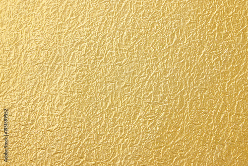金色の揉み和紙の質感がある和風背景テクスチャ素材　Golden momigami washi paper texture and Japanese style background