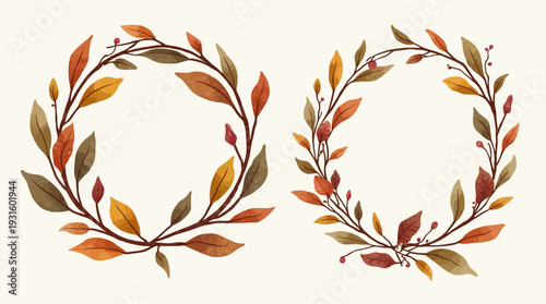 Two beautiful autumn wreaths feature vibrant fall leaves and tiny berry accents