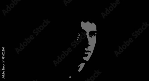 Mysterious silhouette profile of a man's face on a solid black background, creating an artistic and enigmatic portrait.