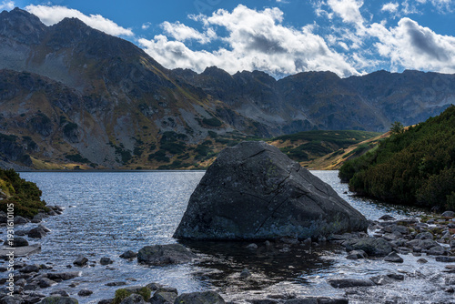 Boulder in the Great Polish Pond. Tatra Mountains.