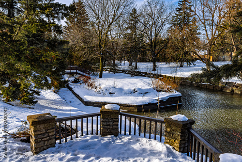Fotografija Shakespearean Gardens park at Stratford, near the Avon River, covered in snow  in the winter