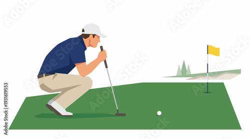 Man in blue shirt crouches on green grass to hit golf ball with club near flag.