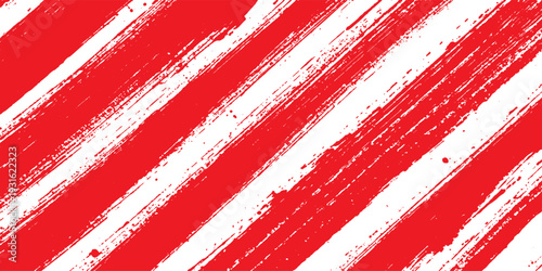 Vintage red and white striped grunge background with a seamless diagonal line pattern on textured cotton fabric wallpaper design