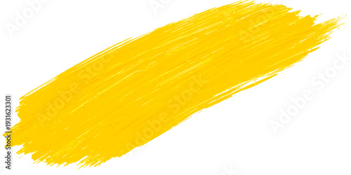 A closeup of a raw spaghetti pasta bunch and a wooden yellow paint brush isolated on a fresh white background for a healthy Italian cooking diet