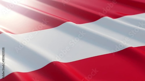 Waving flag of Austria with red and white stripes illuminated by bright sunlight, showcasing national pride.