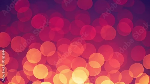 Vibrant bokeh lights creating a dreamy and abstract background with warm colors.