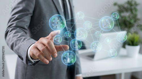 Businessman interacting with social media icons in modern office