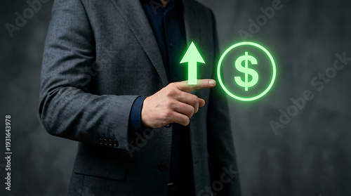 Businessman pointing to growing financial success symbol