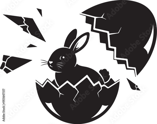 Black silhouette of bunny emerging from cracked eggshell illustration