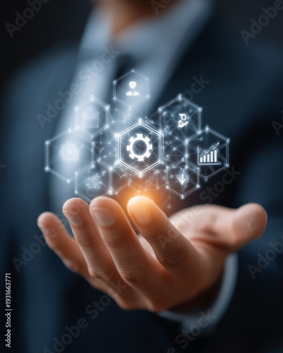 Innovation at Your Fingertips: A professional's hand cradles a futuristic digital interface, symbolizing technology, innovation, and digital transformation in the modern age.