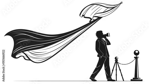 Photographer capturing a moment with a flowing fabric in the background.