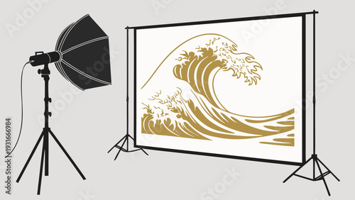 Photography studio setup with a large screen displaying a golden wave illustration.