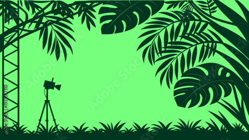 Jungle film set with camera and tropical leaves.