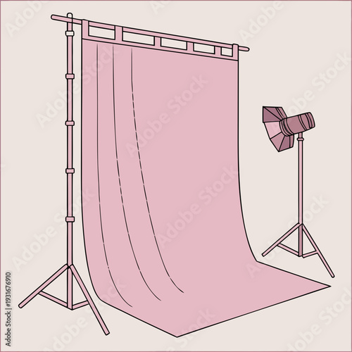 Professional Photo Studio Setup with Pink Backdrop and Lighting Equipment.