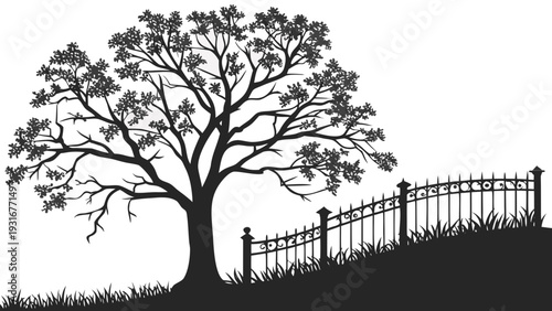 Silhouette of a large tree and an ornate fence on a grassy hill.