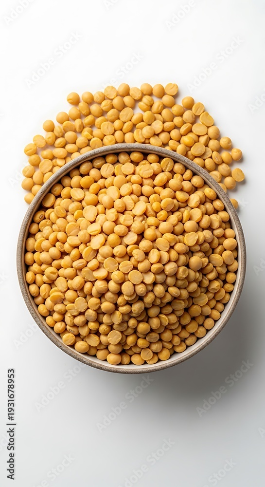 Fototapeta premium Chana Dal - Split Chickpeas in a Bowl on White Background.