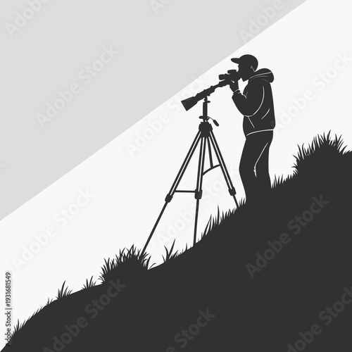 Silhouette of a photographer with a camera on a tripod on a grassy hill capturing the landscape.