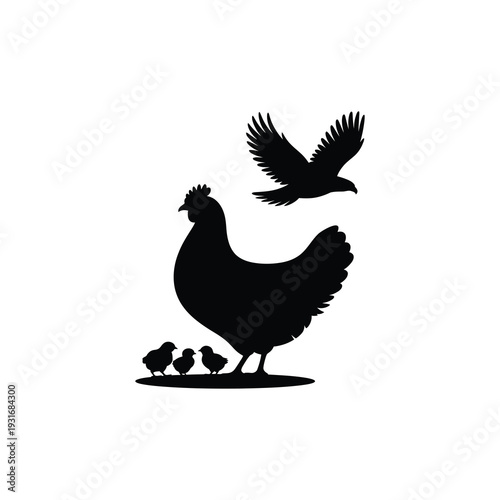 A silhouette of a mother hen and her chicks with a eagle flying above