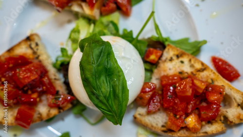 Wallpaper Mural Italian crostini appetizer arranged on plate showcasing toasted bread and savory toppings Torontodigital.ca